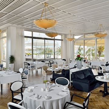 a room with tables and chairs