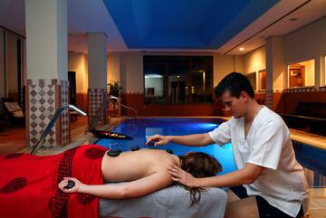 a man massaging a woman's back