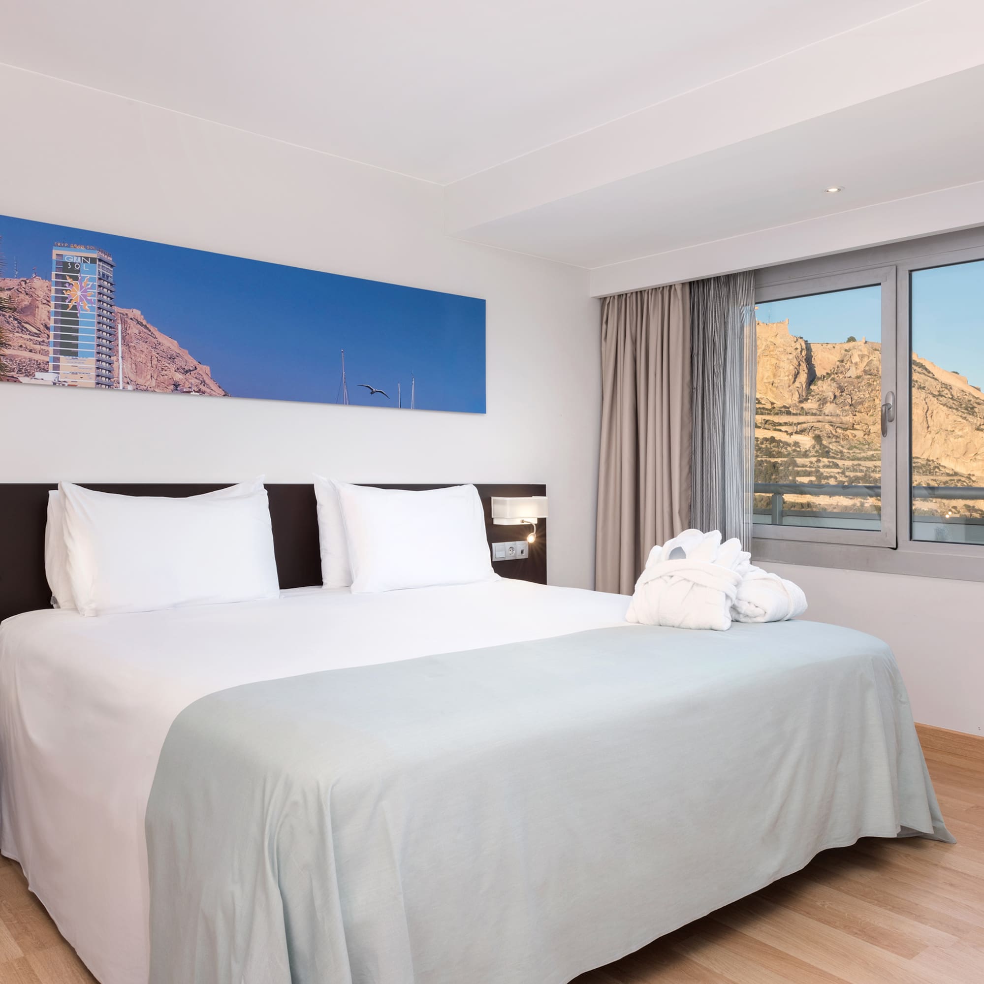 a bed with a towel on it