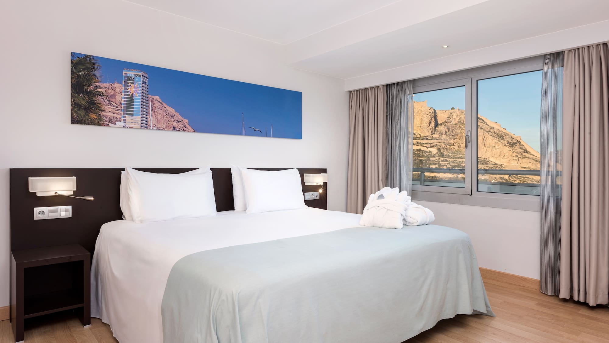 a bed with a towel on it