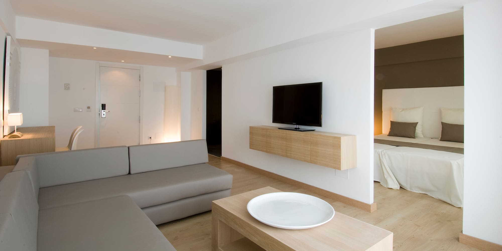 a living room with a tv and a couch