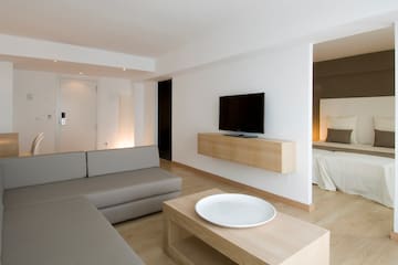 a living room with a tv and a couch