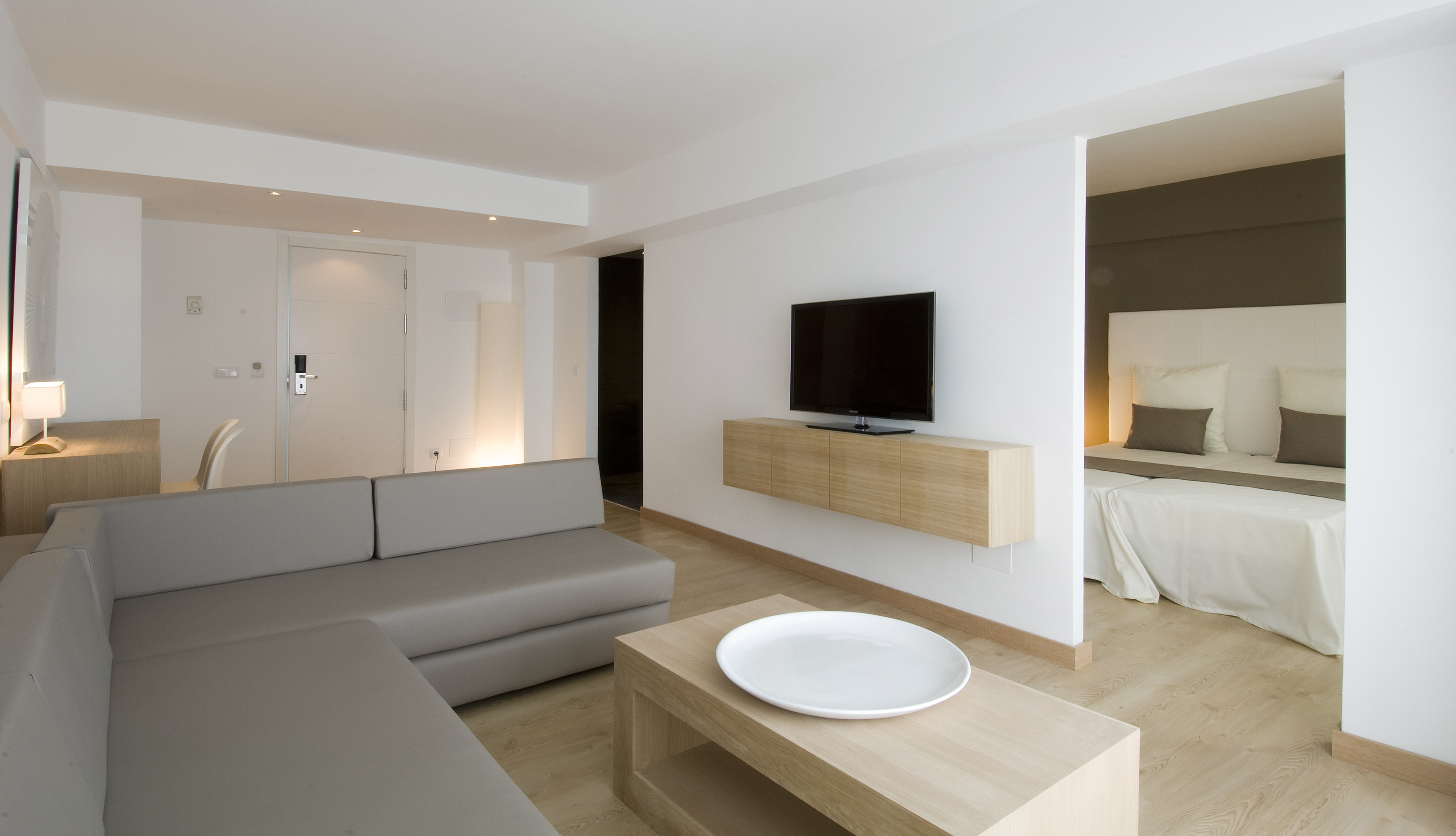 a living room with a tv and a couch