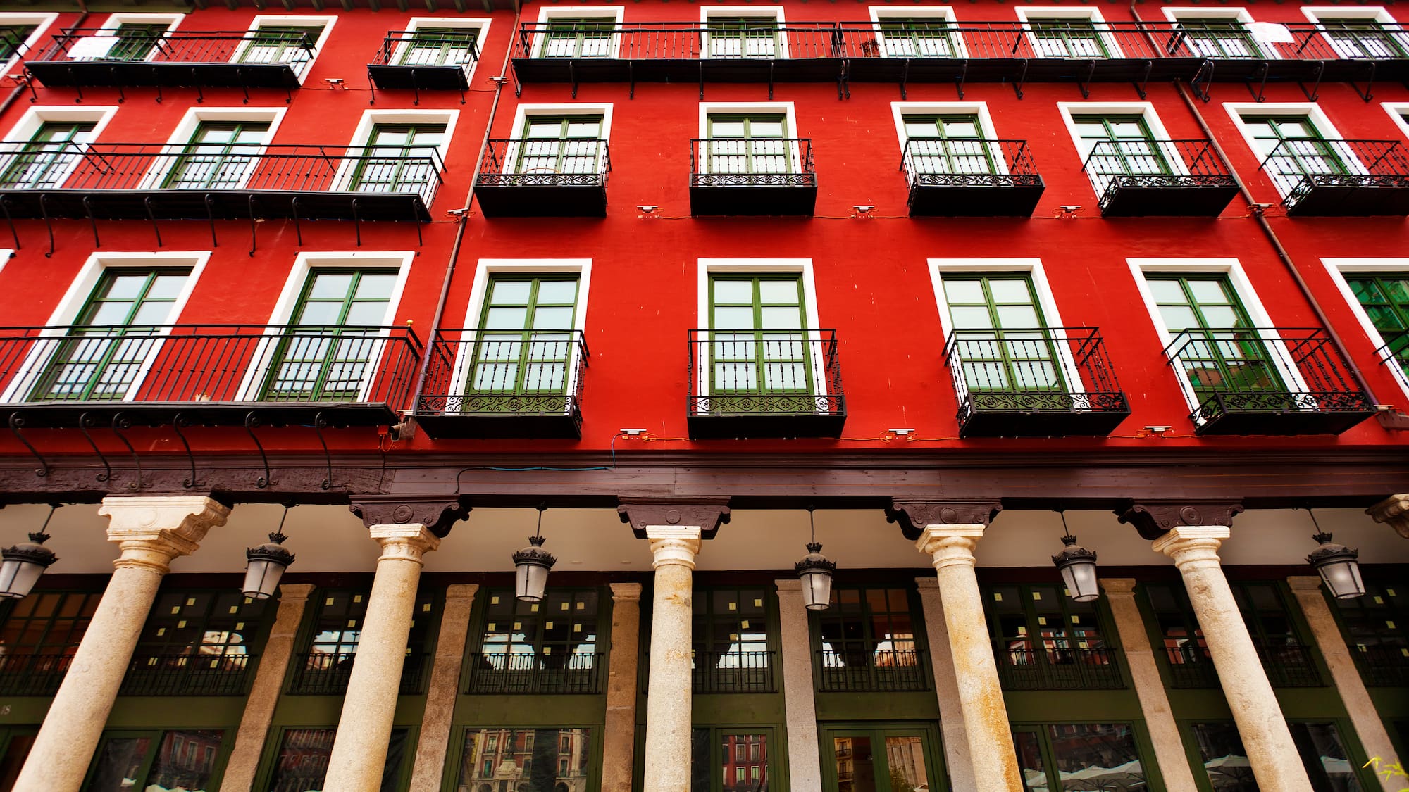 a red building with white columns