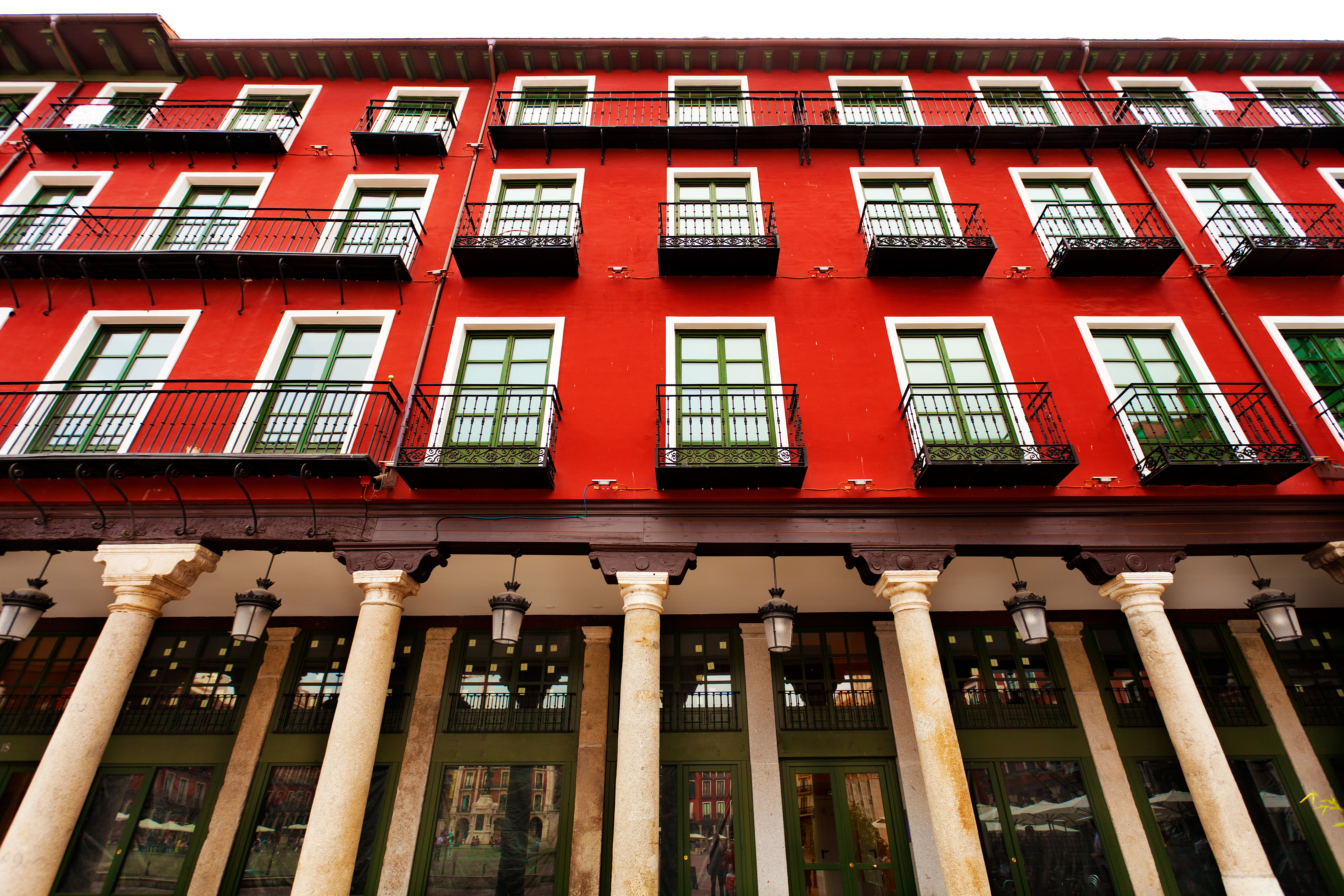 a red building with white columns