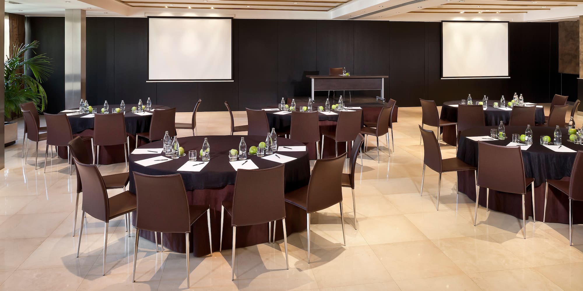 a room with tables and chairs