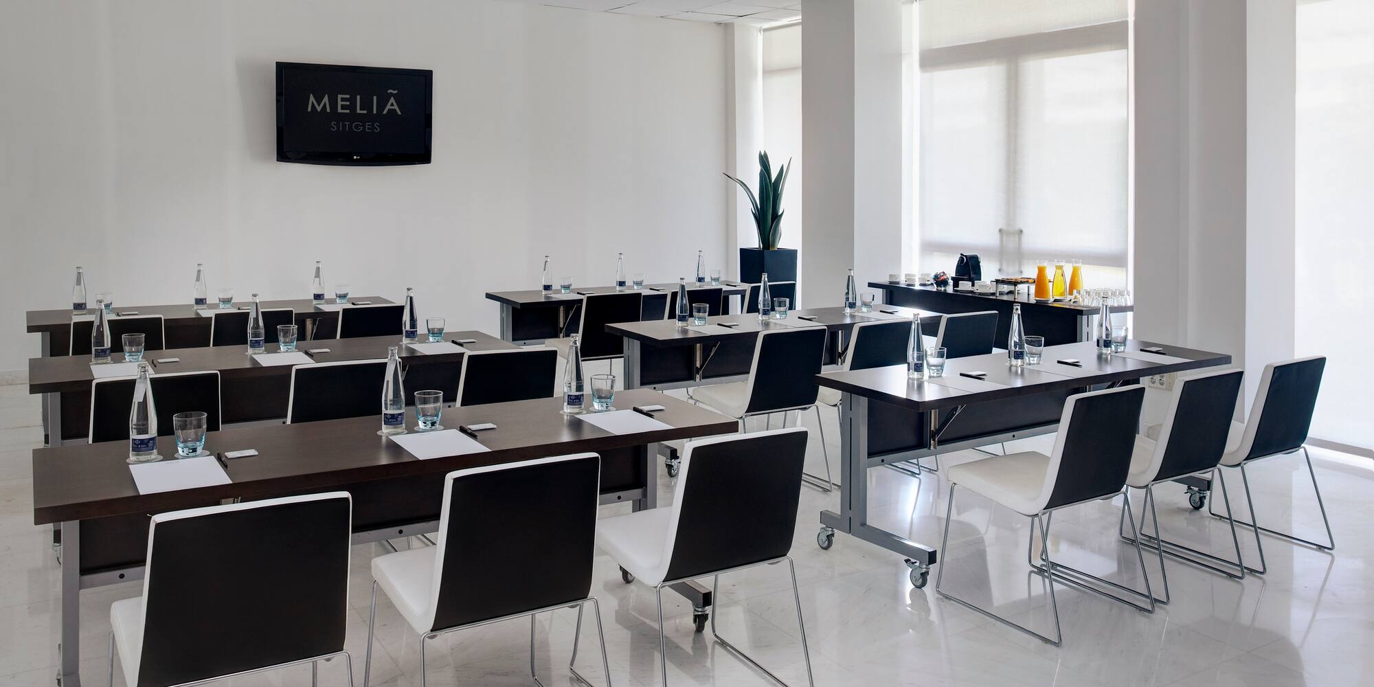 a room with tables and chairs