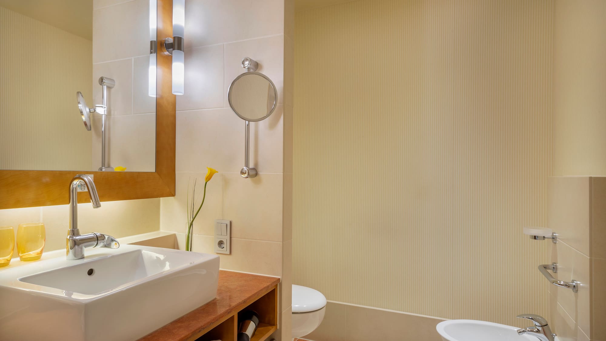 a bathroom with a sink and toilet