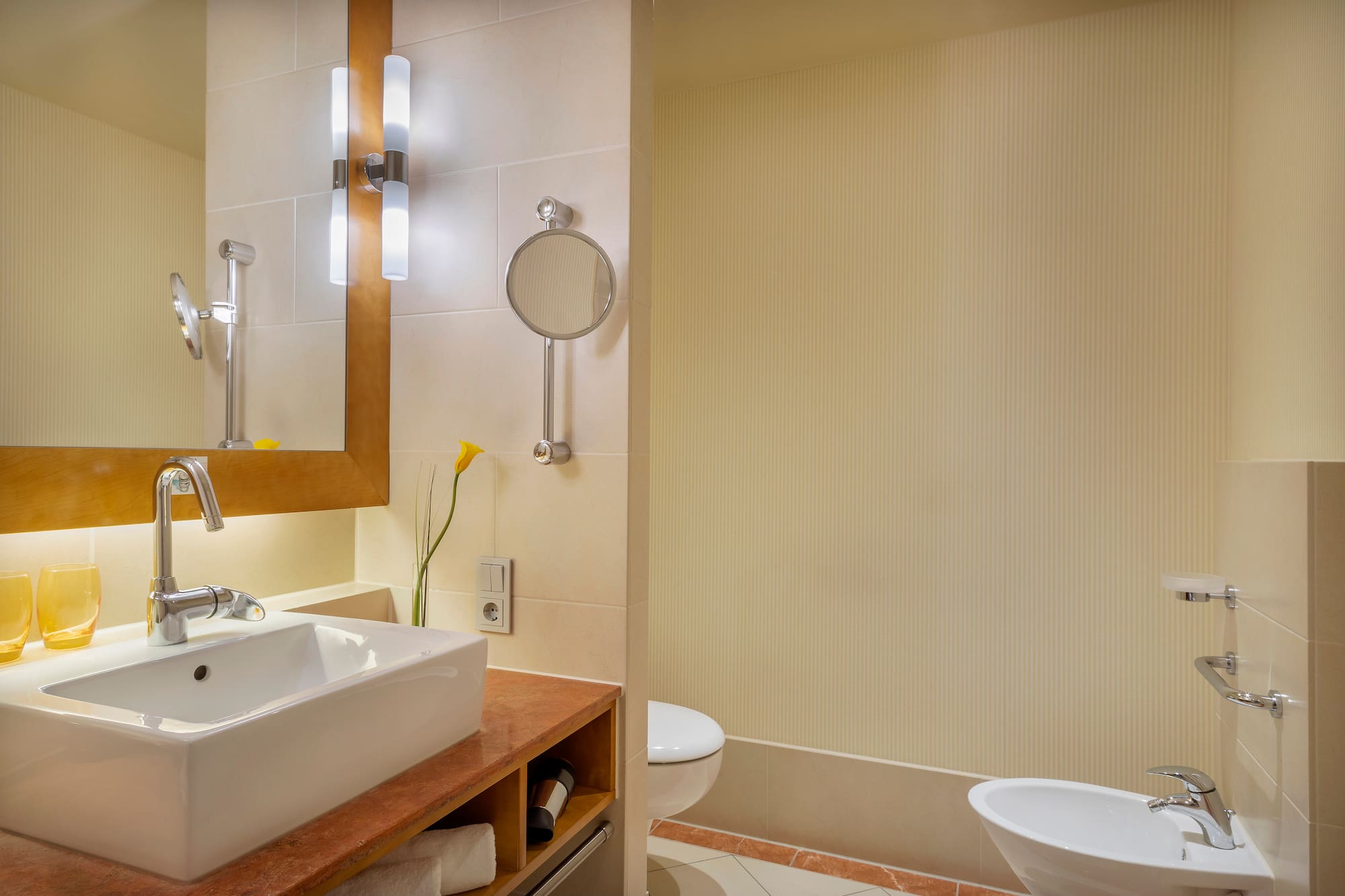 a bathroom with a sink and toilet