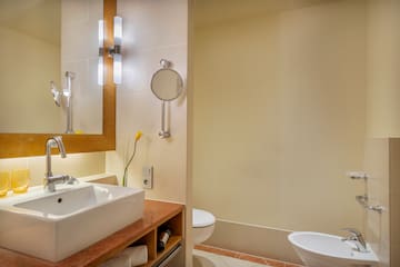 a bathroom with a sink and toilet