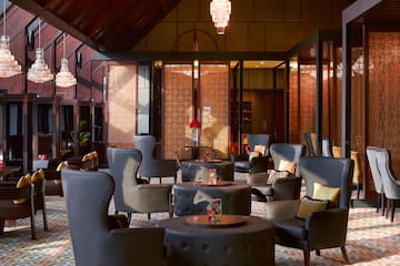 a room with chairs and tables
