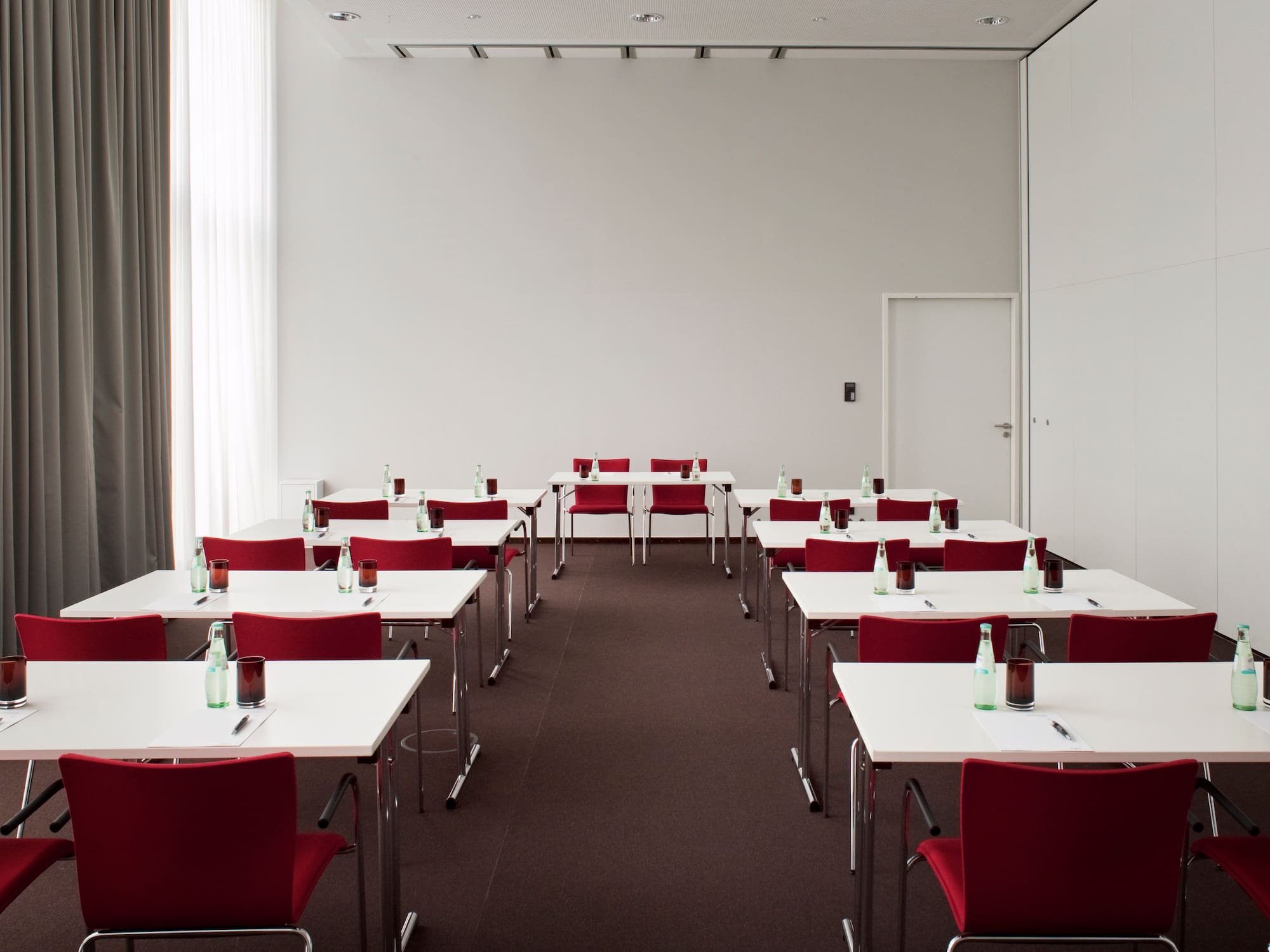 a room with tables and chairs