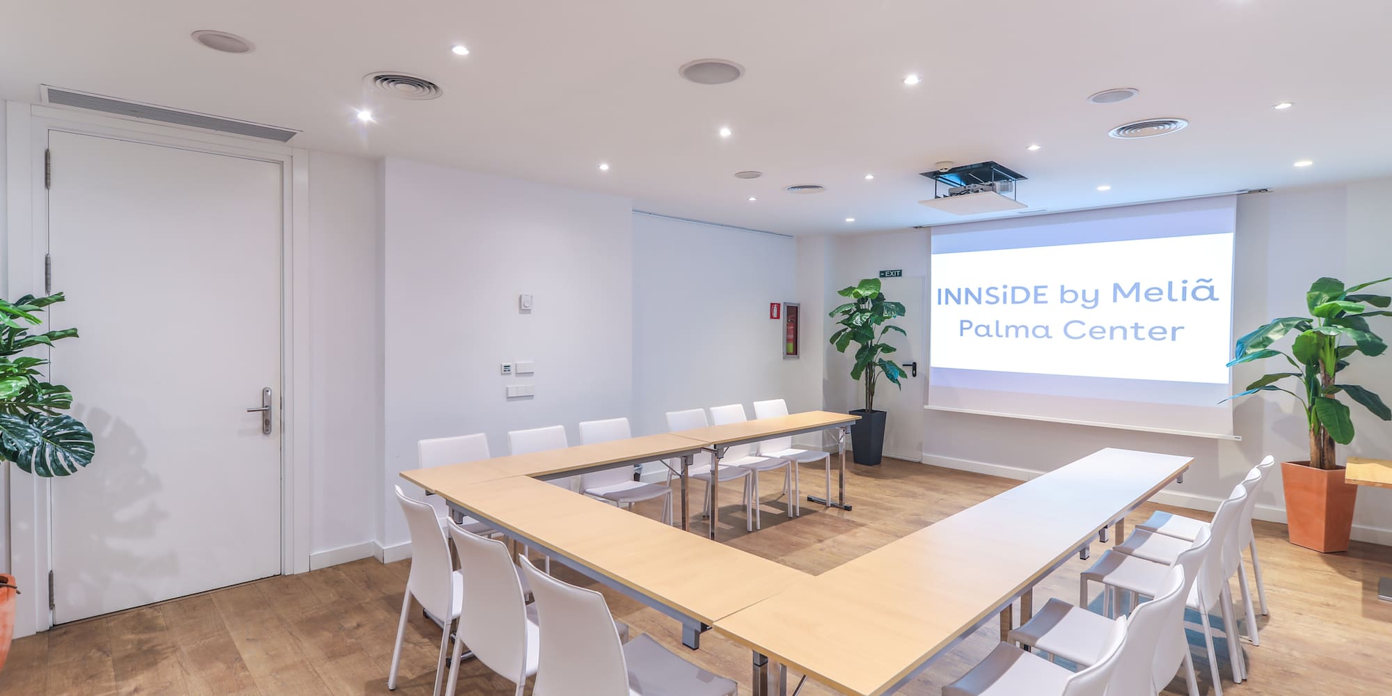 a room with a table and chairs