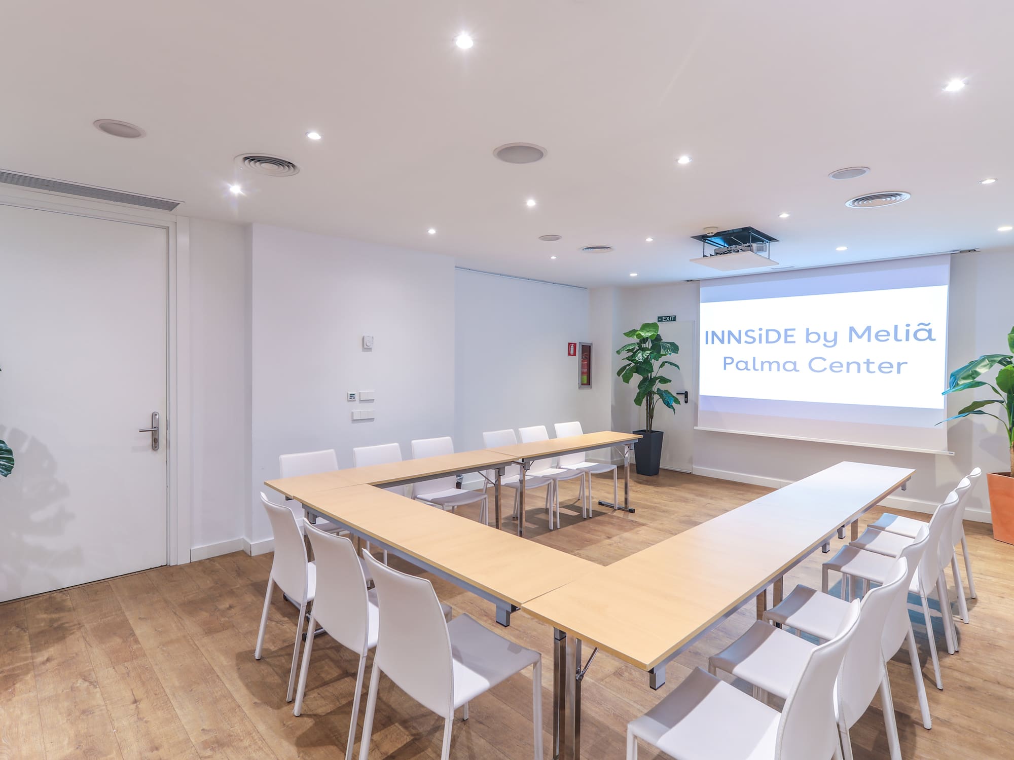a room with a table and chairs