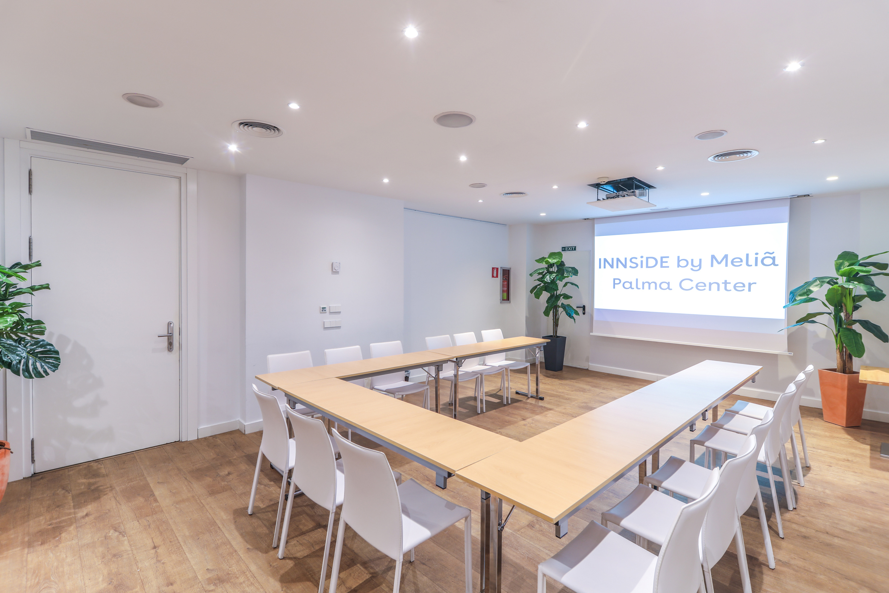 a room with a table and chairs