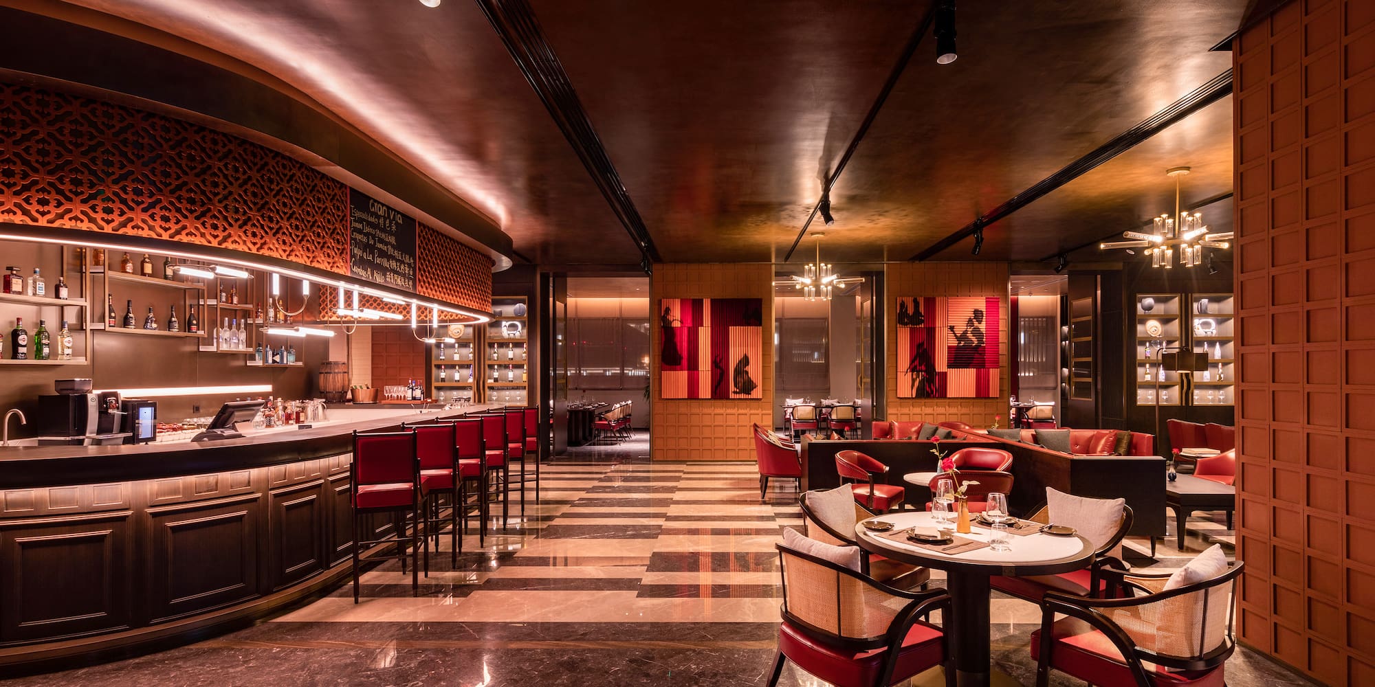 a restaurant with tables and chairs