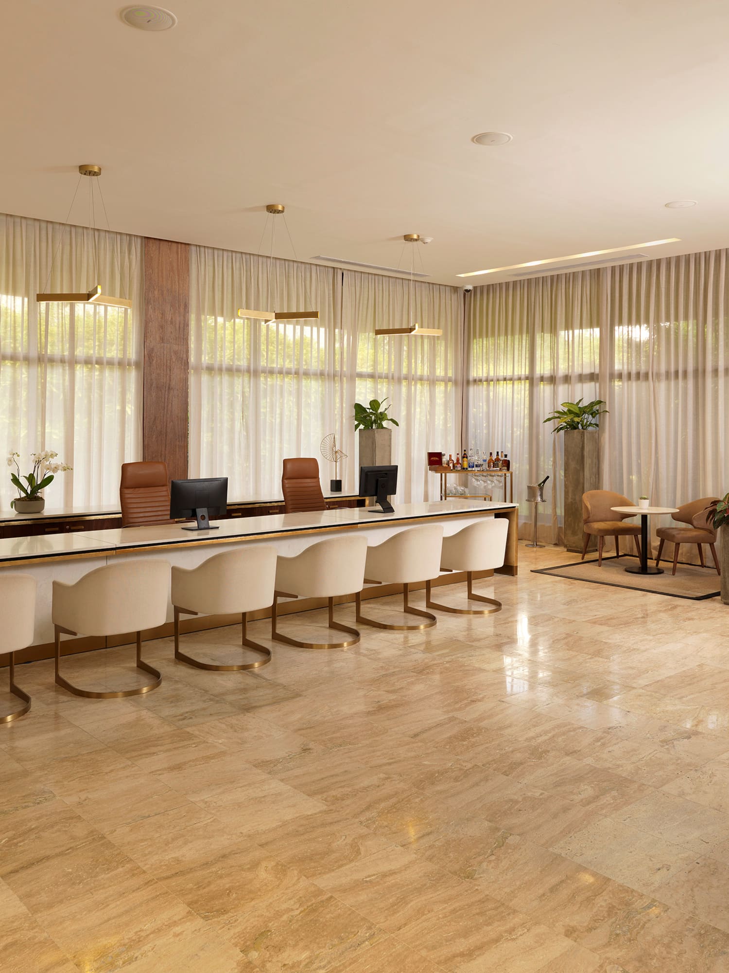 a room with a large table and chairs