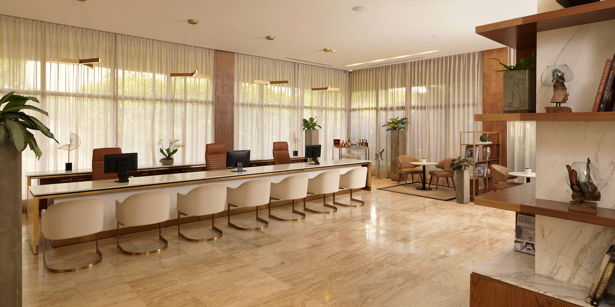 a room with a large table and chairs