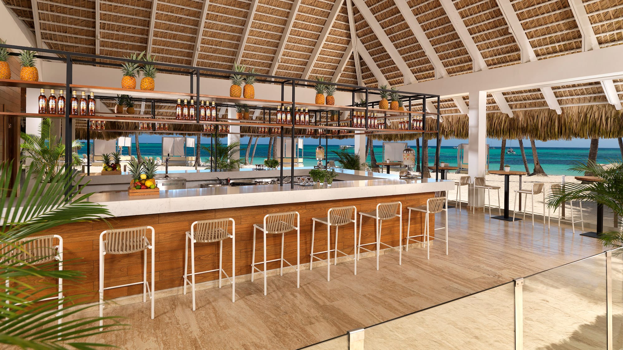 a bar with a shelf and chairs in a tropical restaurant