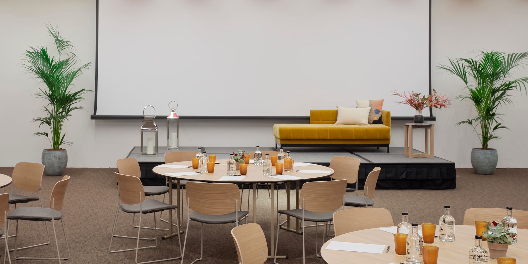 a room with tables and chairs