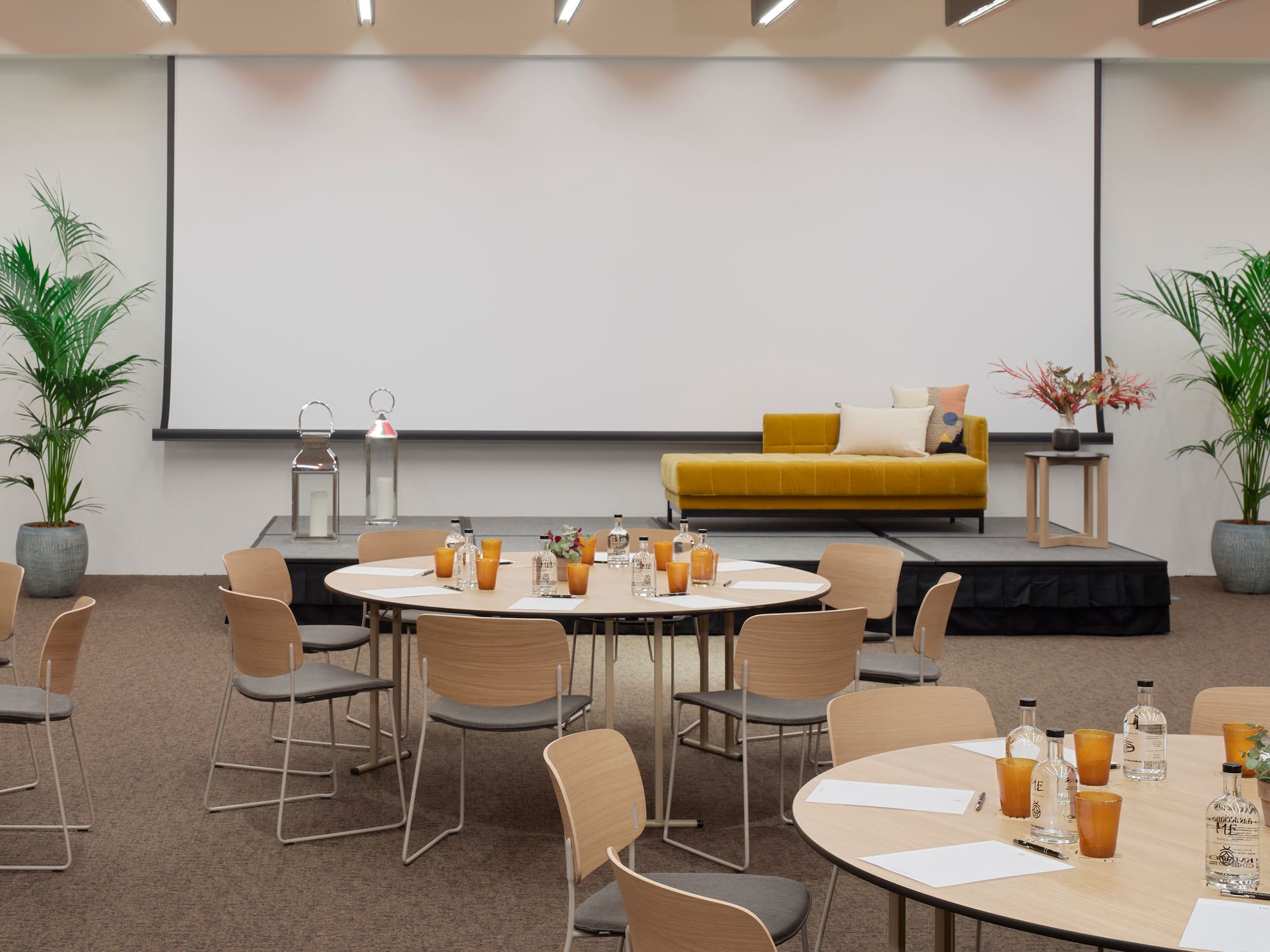 a room with tables and chairs