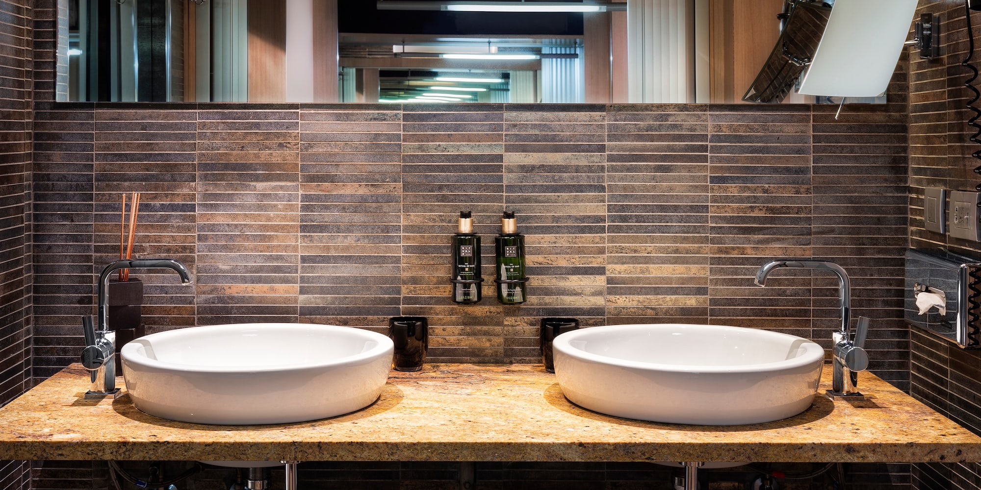 a bathroom with two sinks