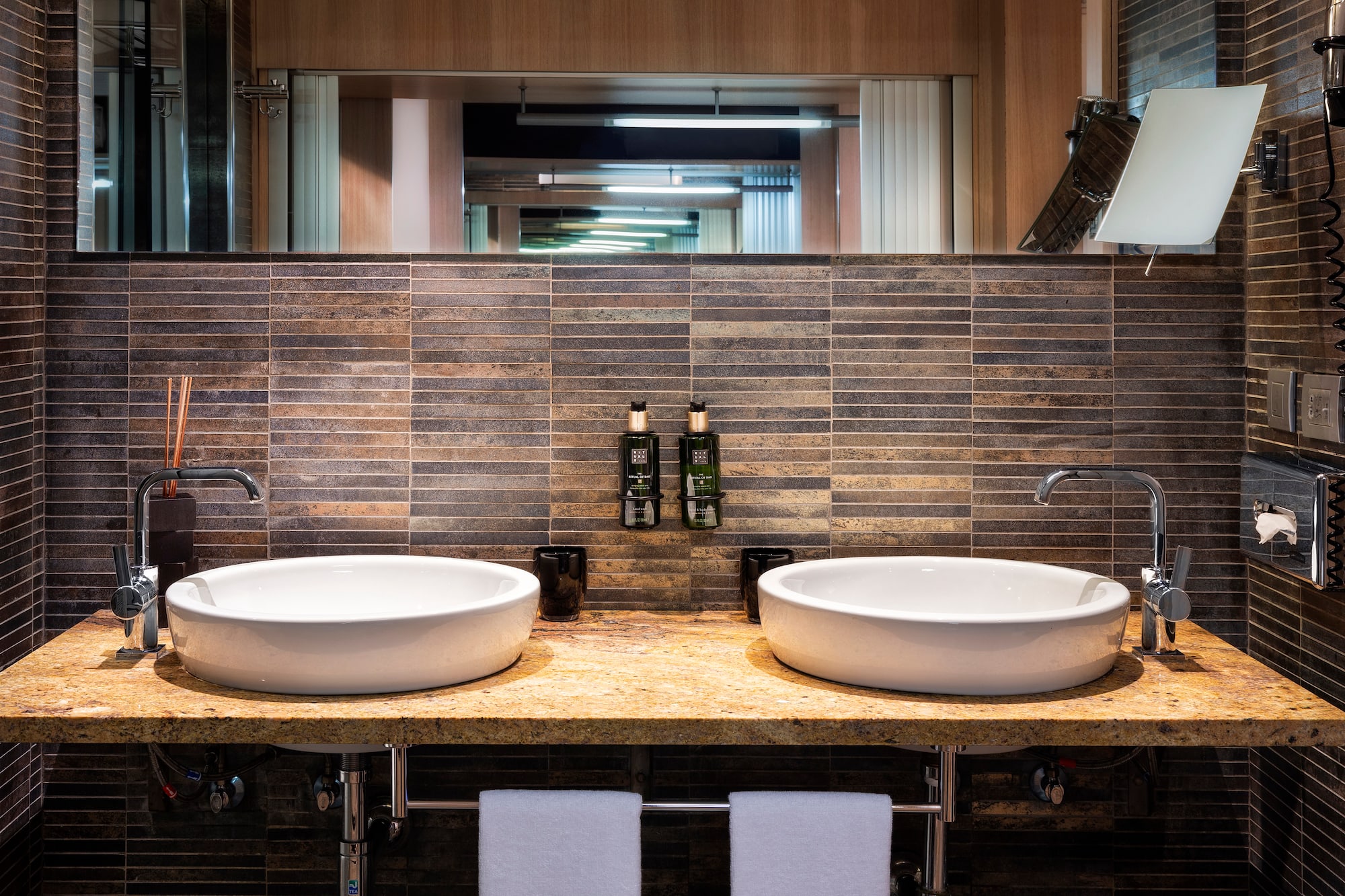 a bathroom with two sinks