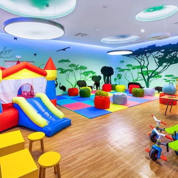 a room with a playroom with a playroom and a playroom with a playroom and a playroom with a playroom and a playroom with a playroom and a playroom with