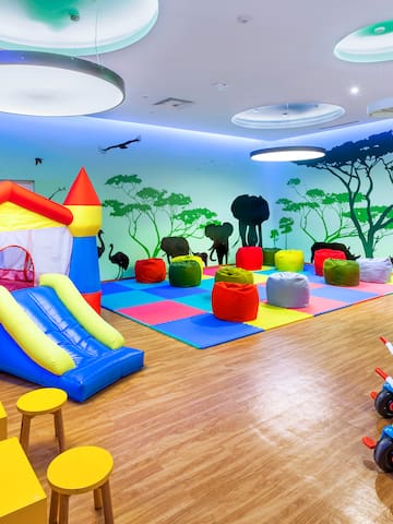 a room with a playroom with a playroom and a playroom with a playroom and a playroom with a playroom and a playroom with a playroom and a playroom with
