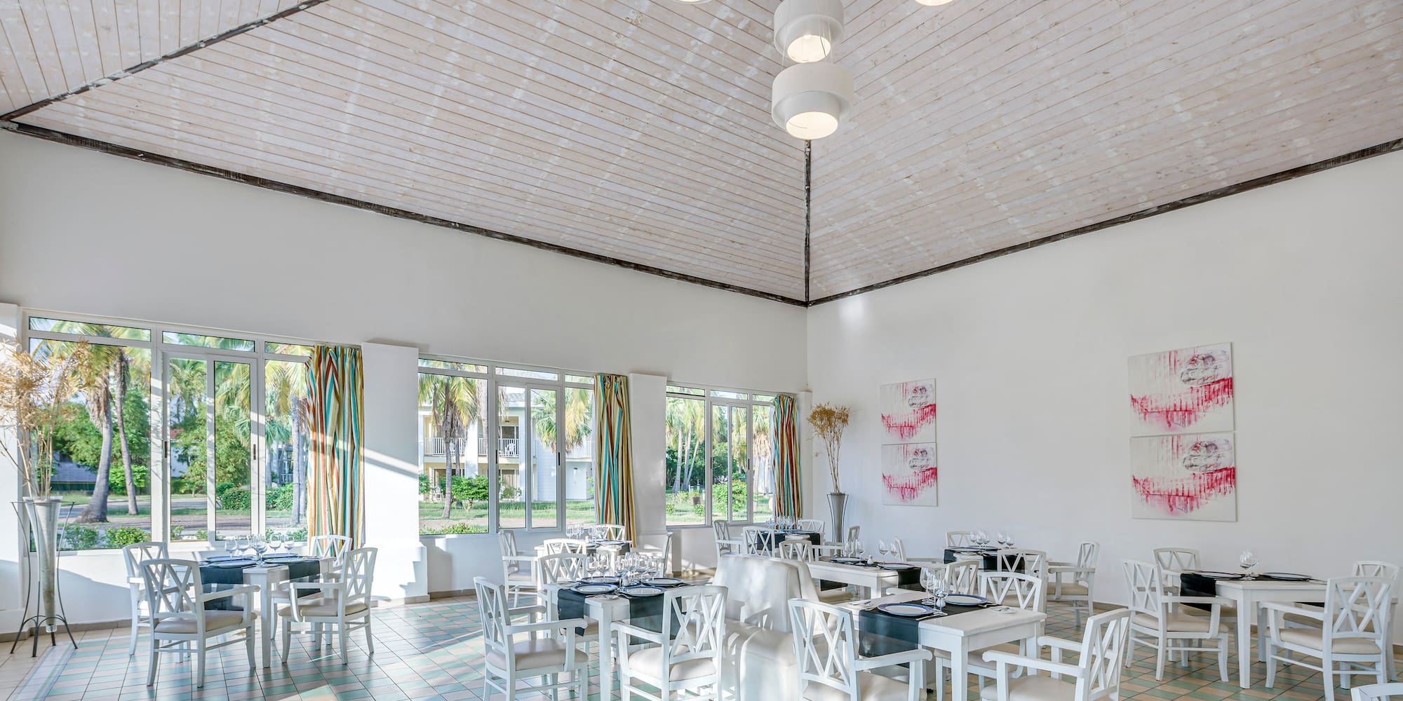 a room with tables and chairs