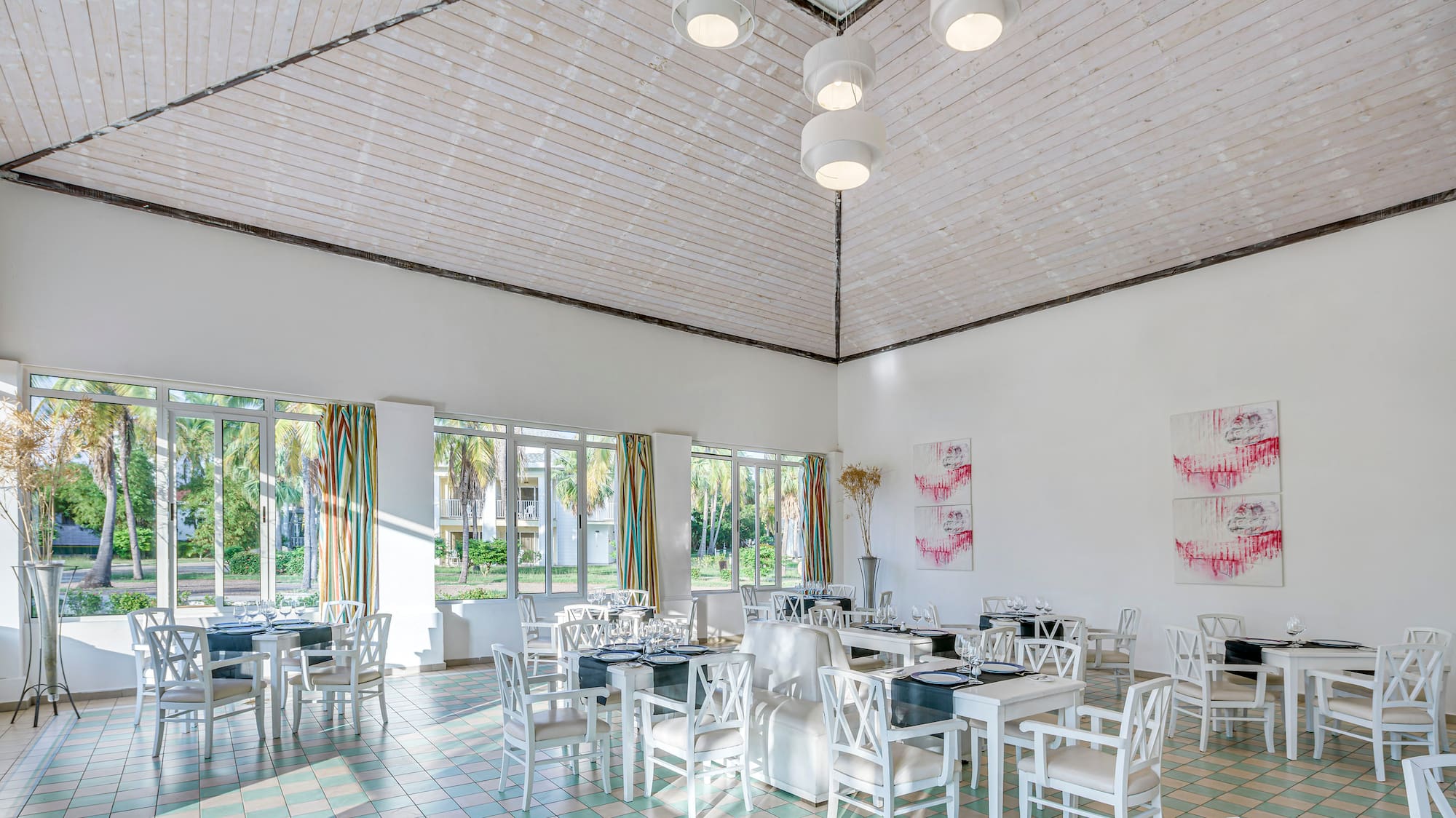 a room with tables and chairs