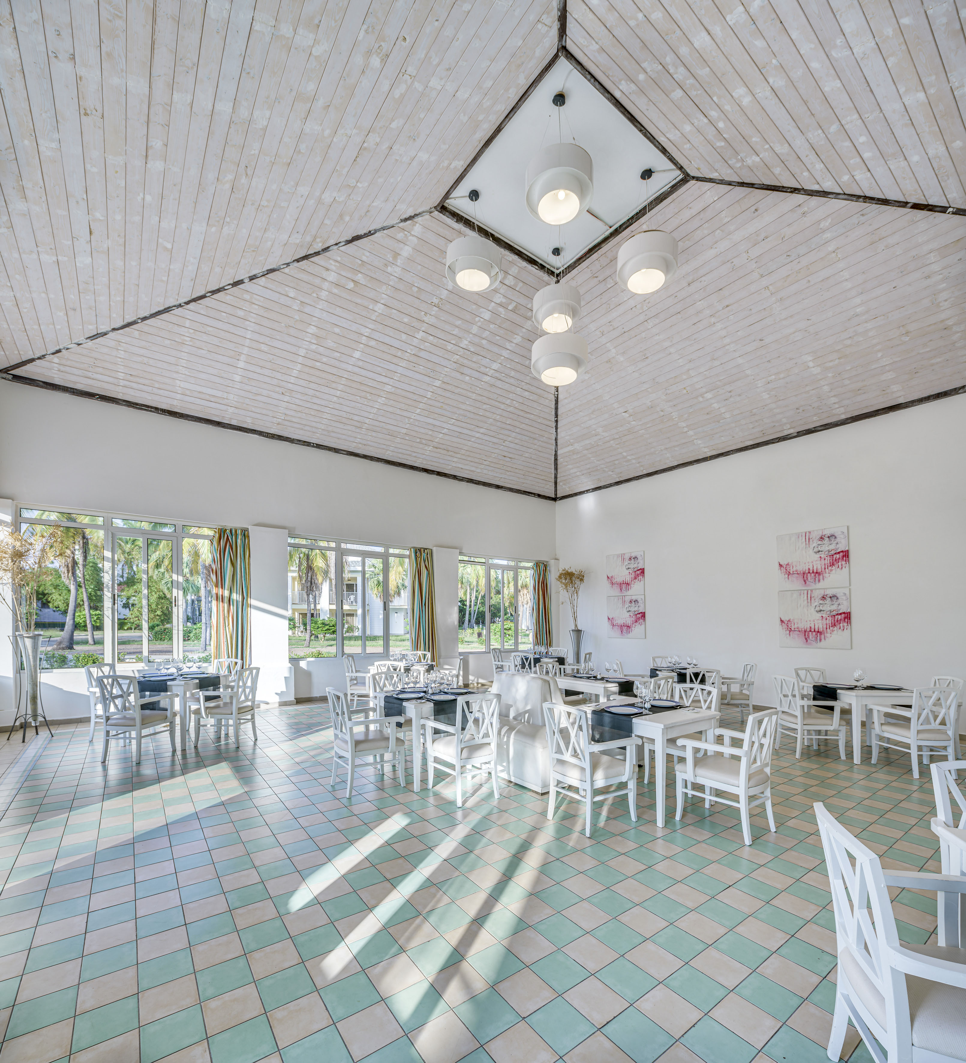 a room with tables and chairs