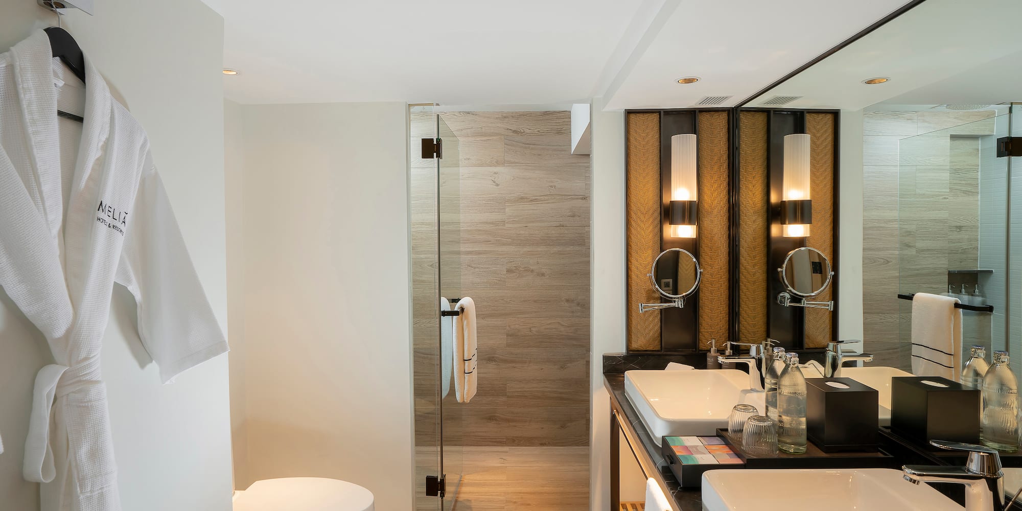 a bathroom with a shower and sink