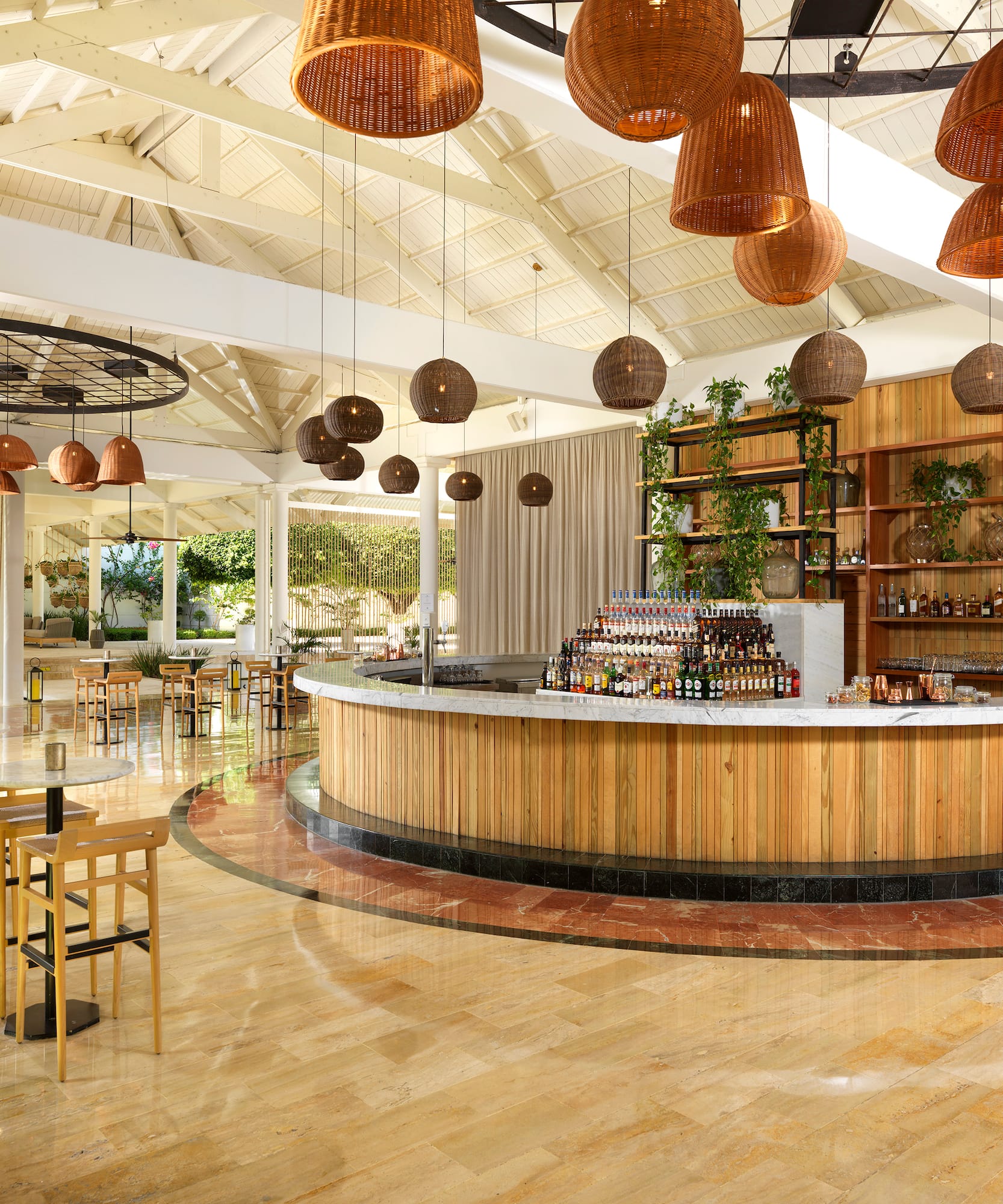 a bar with a counter and chairs