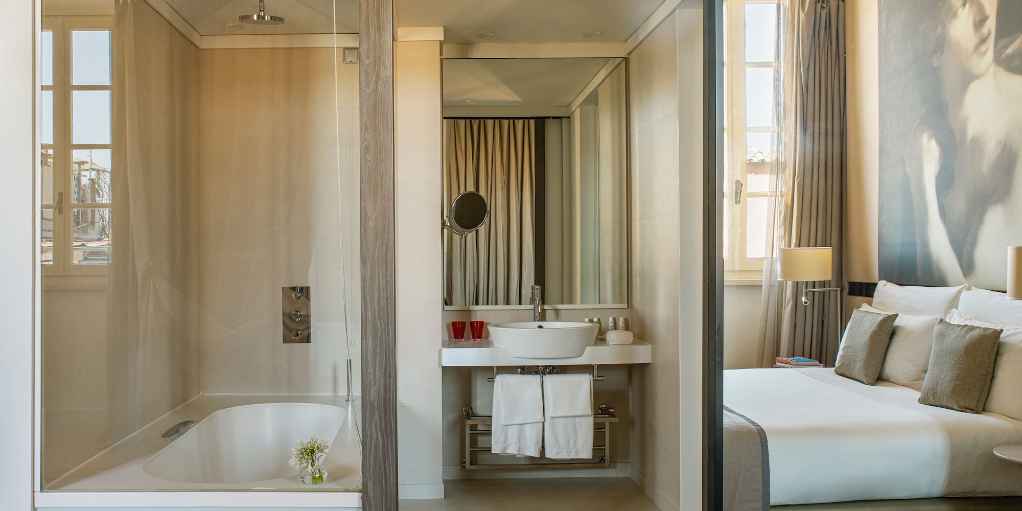 a bathroom with a bathtub and a mirror
