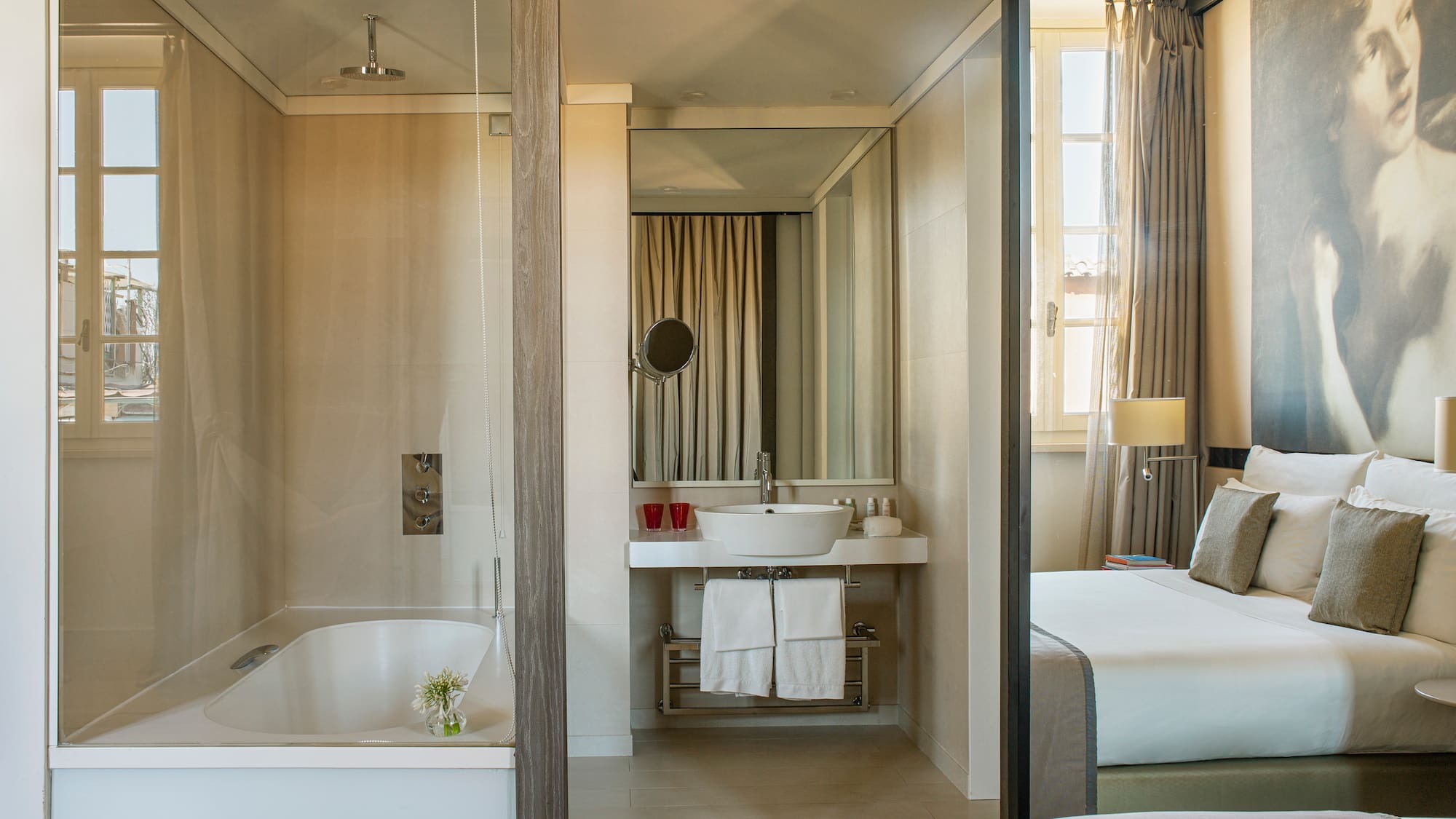 a bathroom with a bathtub and a mirror