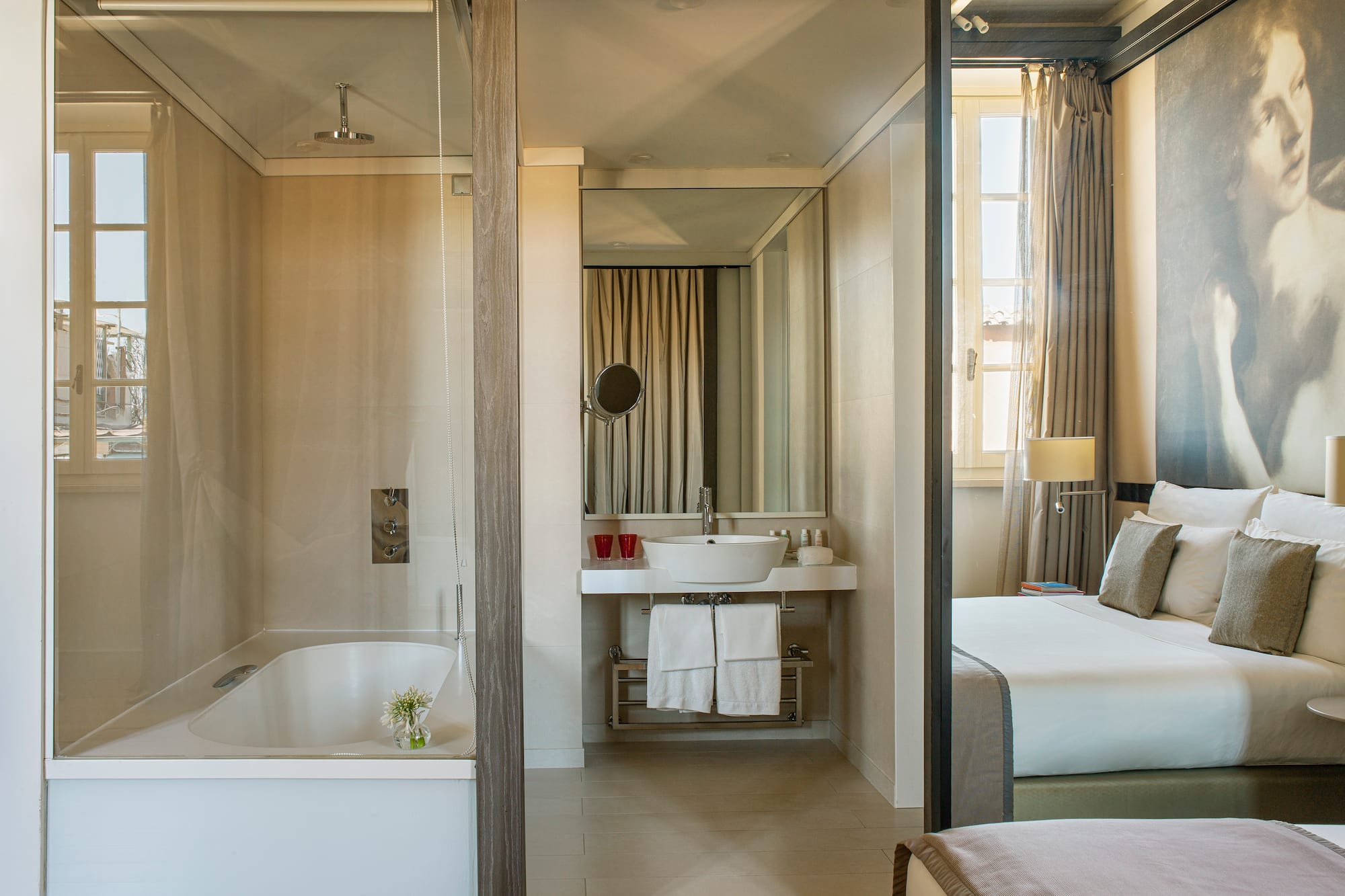 a bathroom with a bathtub and a mirror