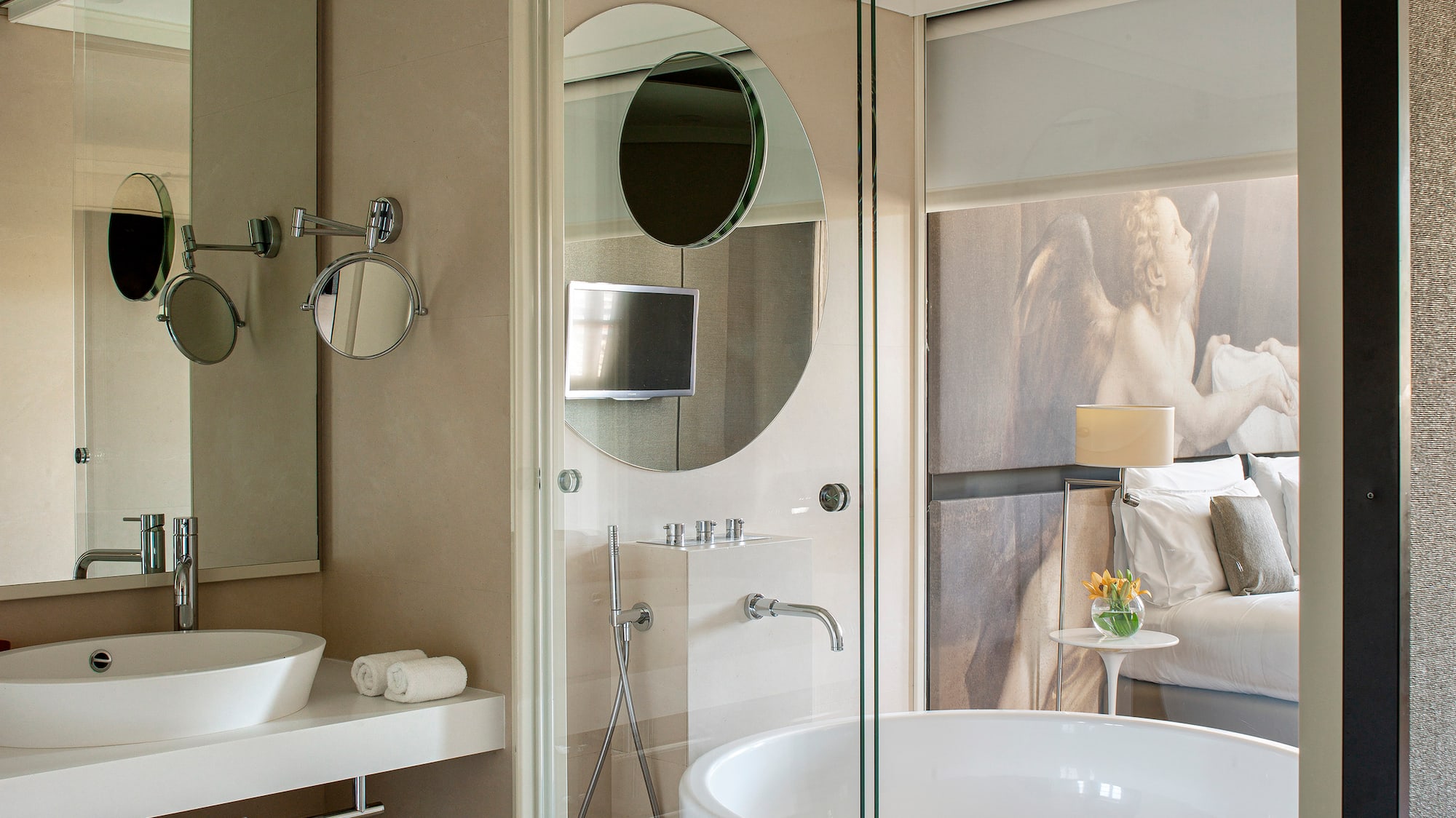 a bathroom with a large tub and a shower