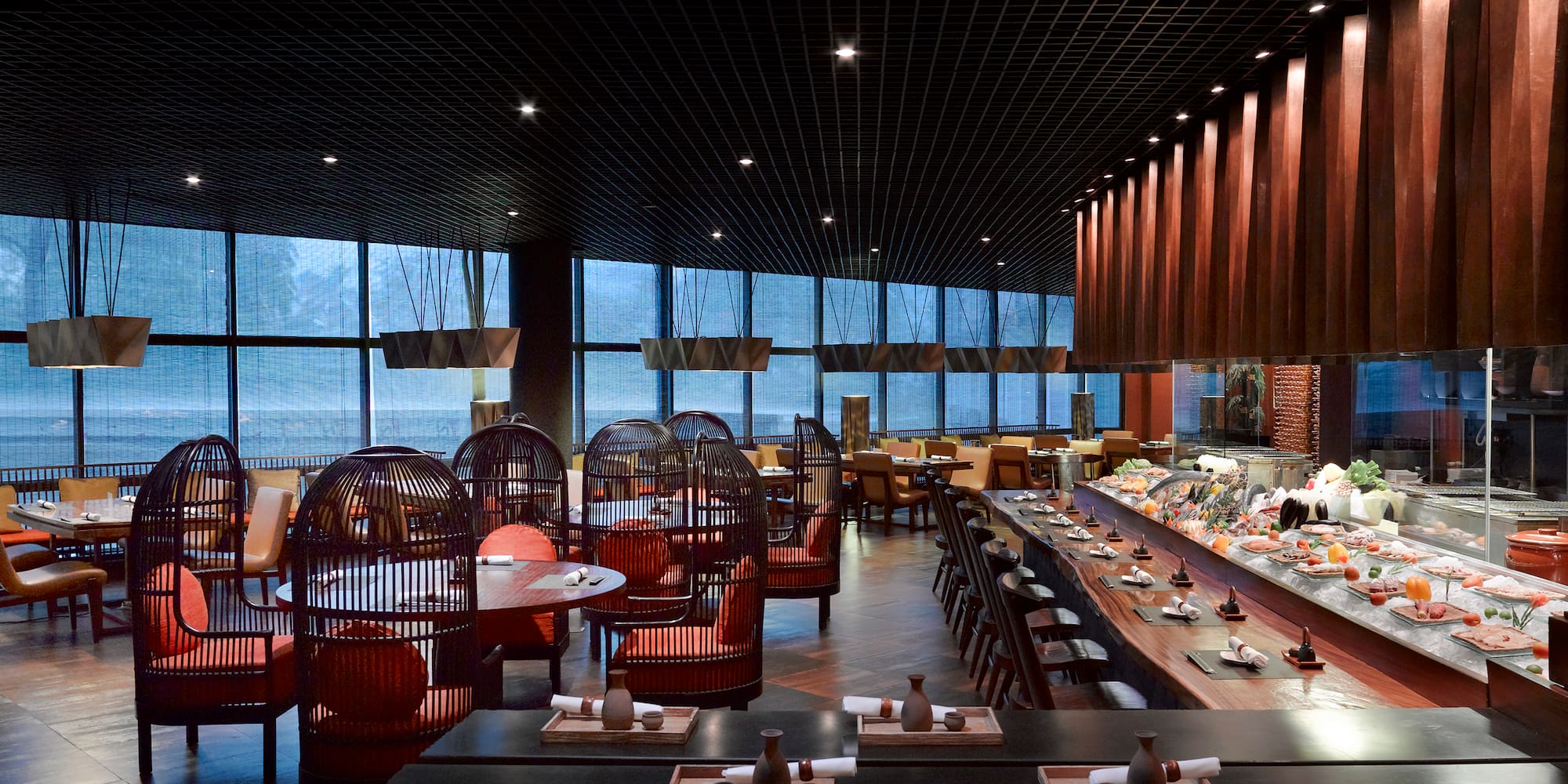 a restaurant with tables and chairs