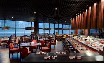 a restaurant with tables and chairs