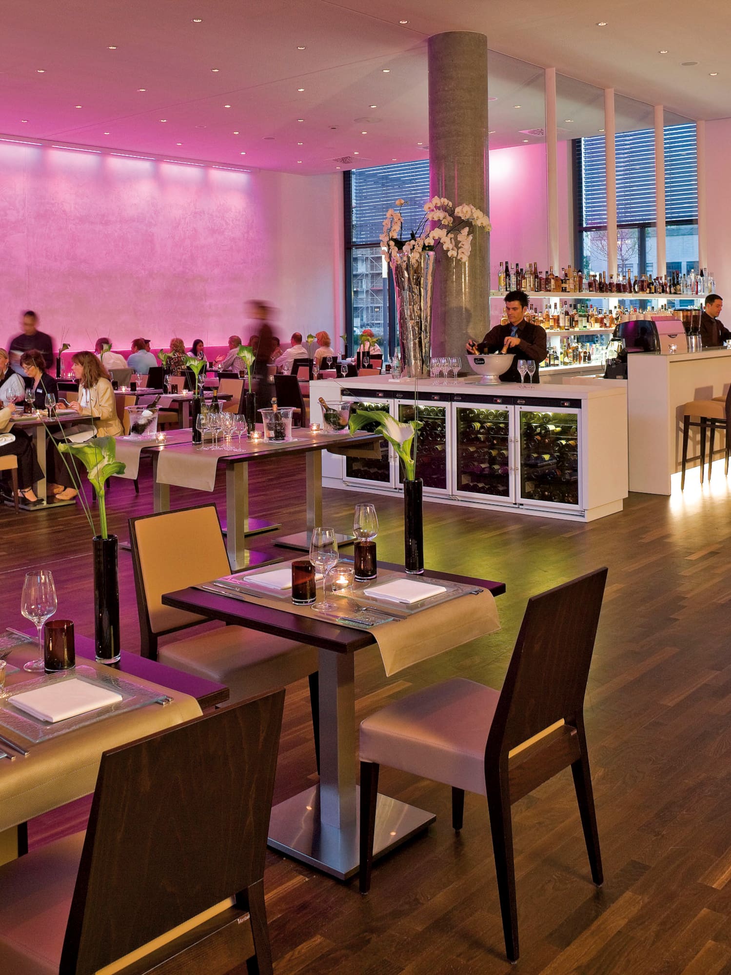 a large room with tables and chairs