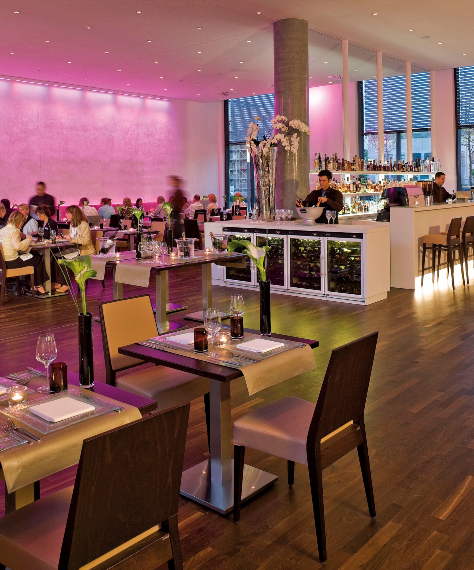 a large room with tables and chairs