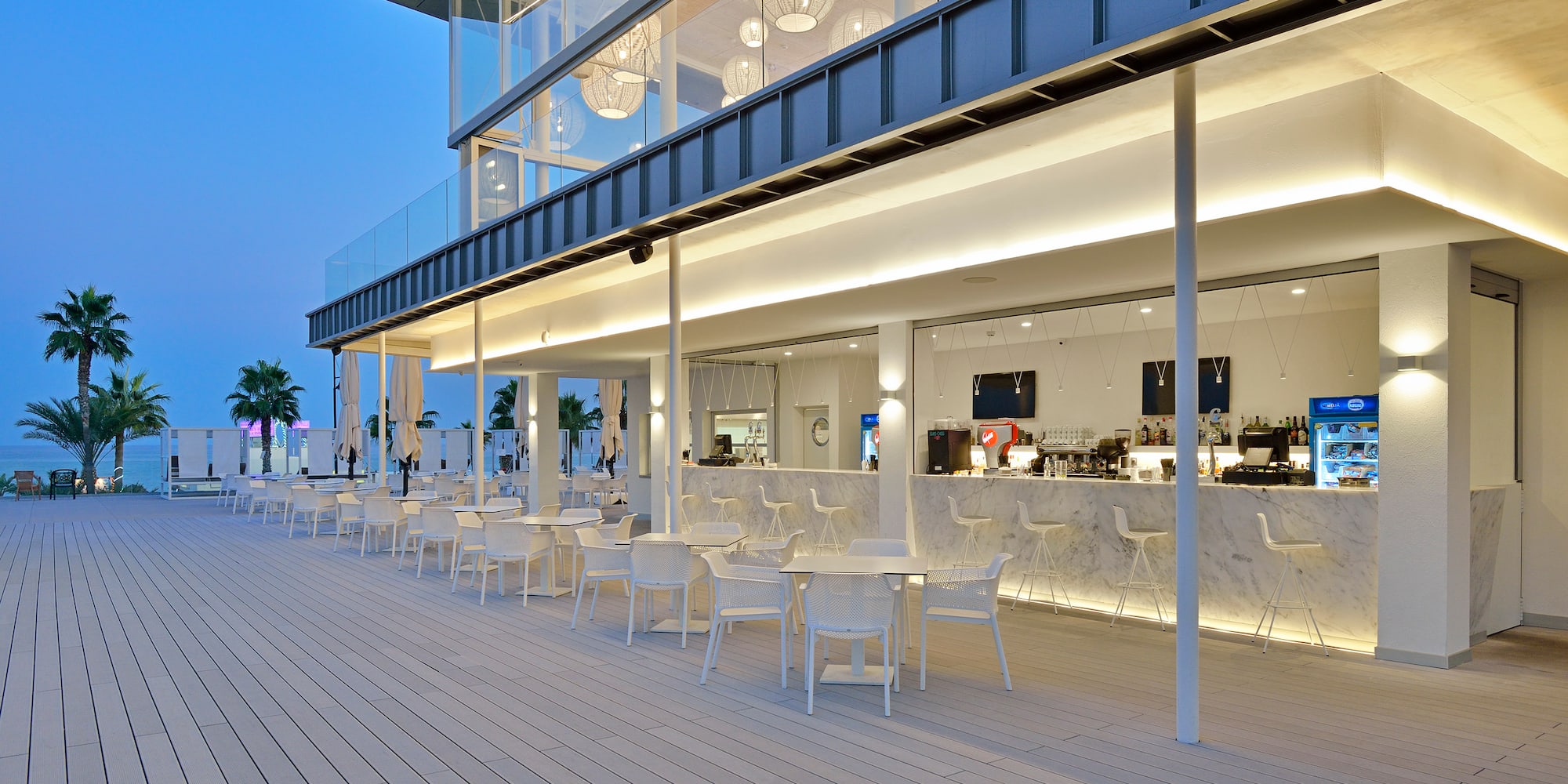 a restaurant with tables and chairs
