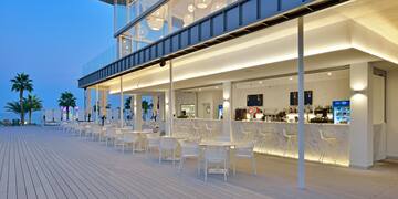 a restaurant with tables and chairs