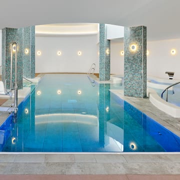 a indoor pool with a large body of water