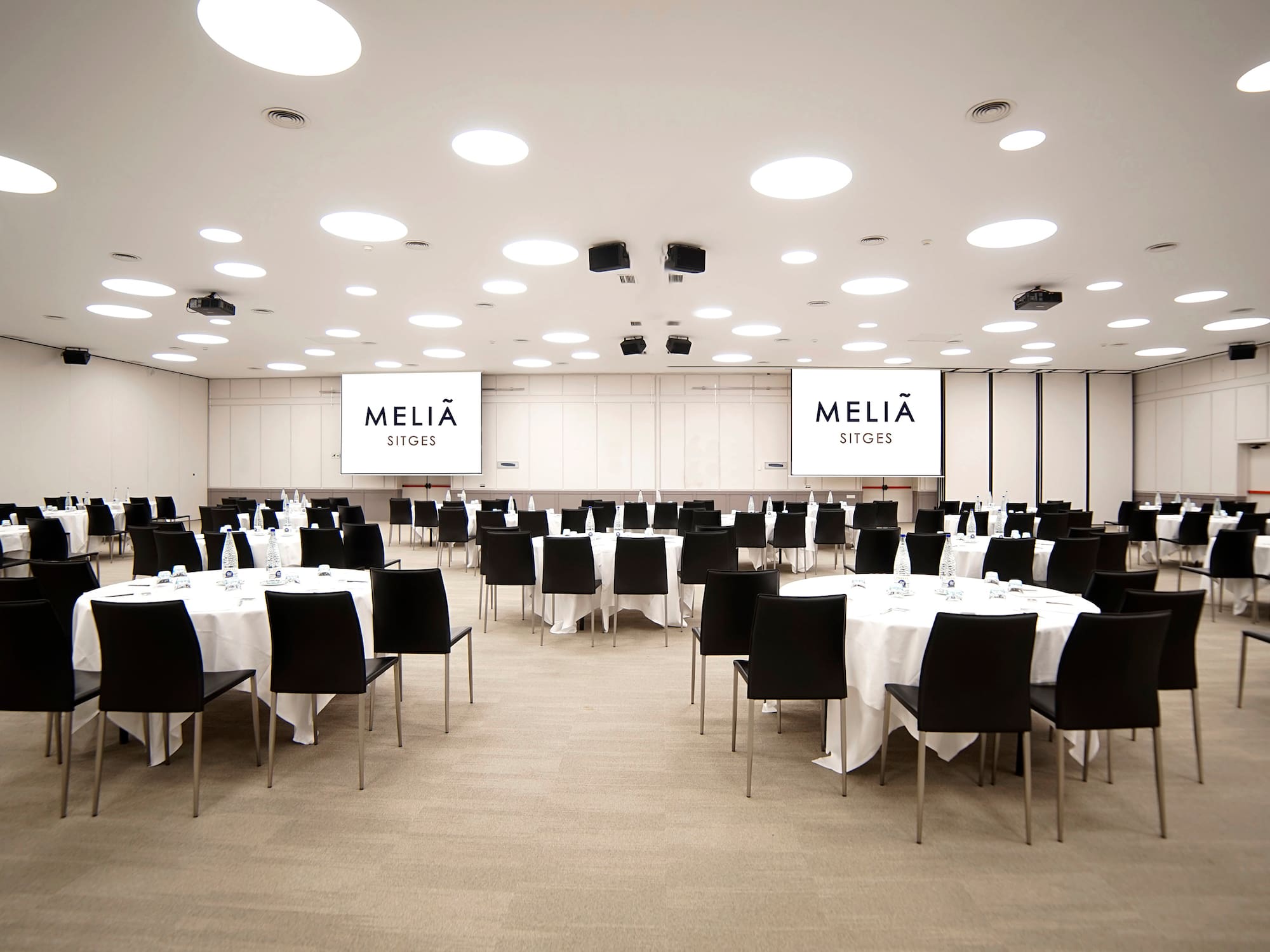 a room with tables and chairs