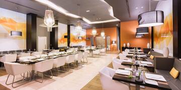 a room with tables and chairs