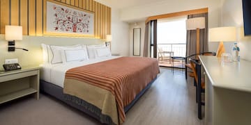 a room with a bed and a table