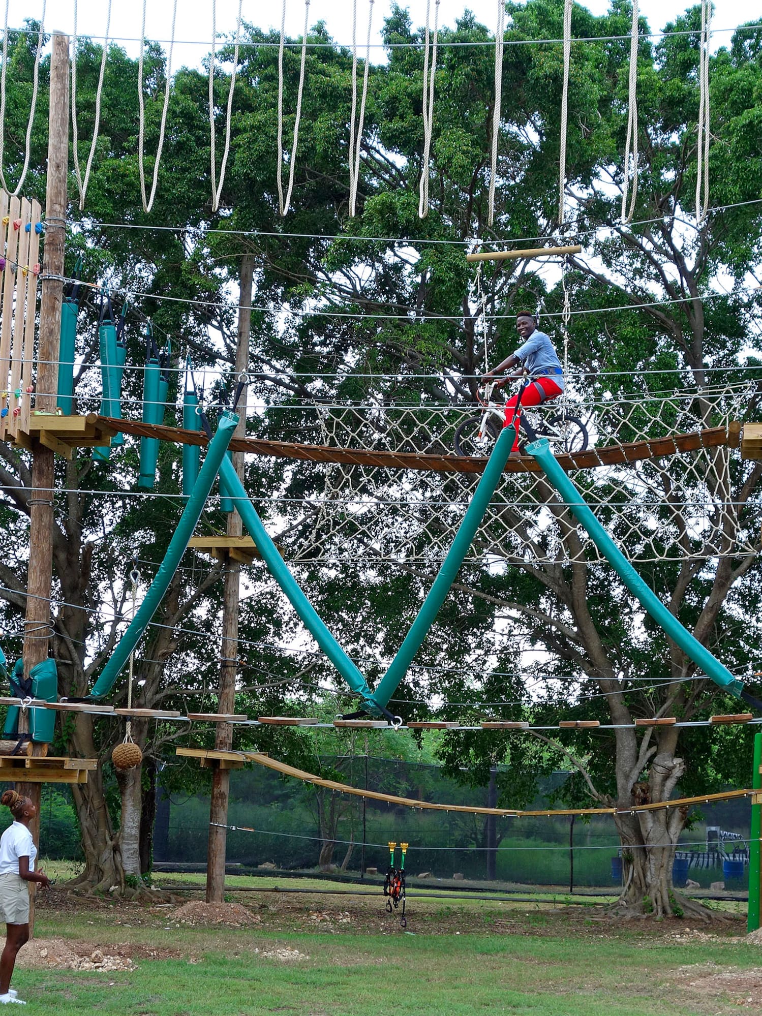 a person on a rope bridge