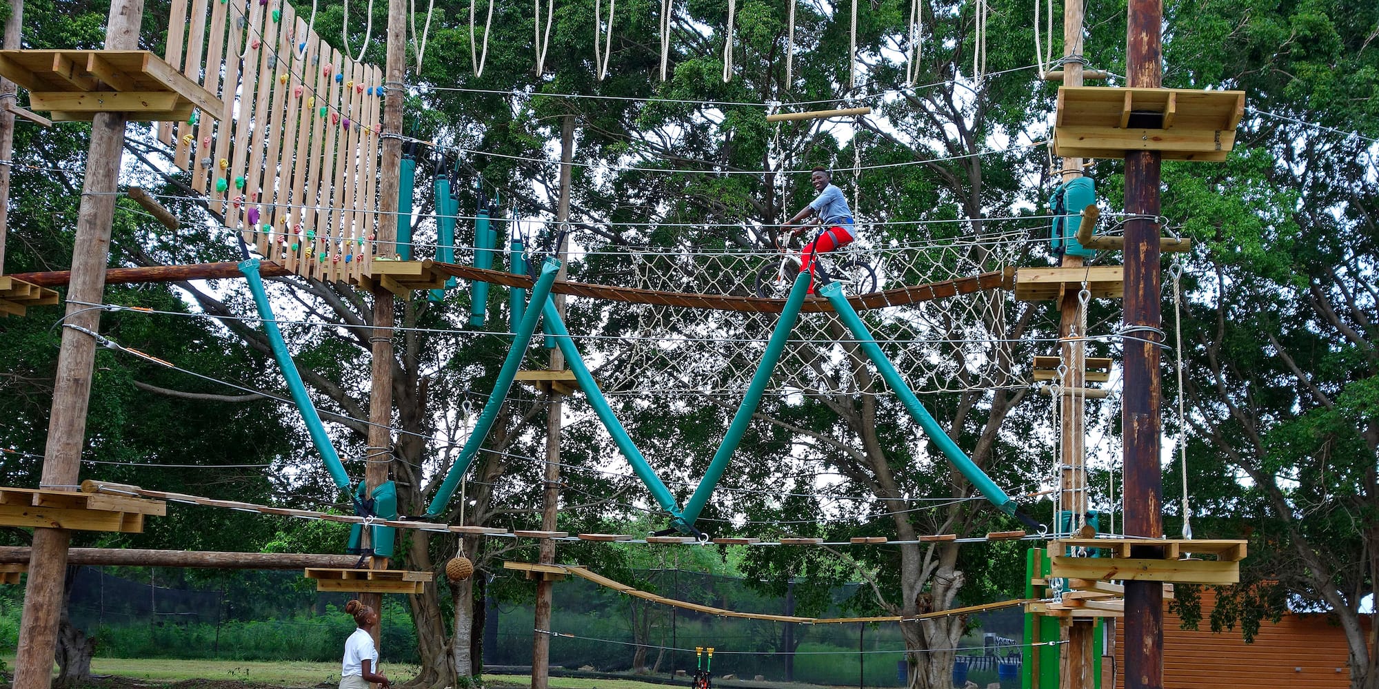 a person on a rope bridge